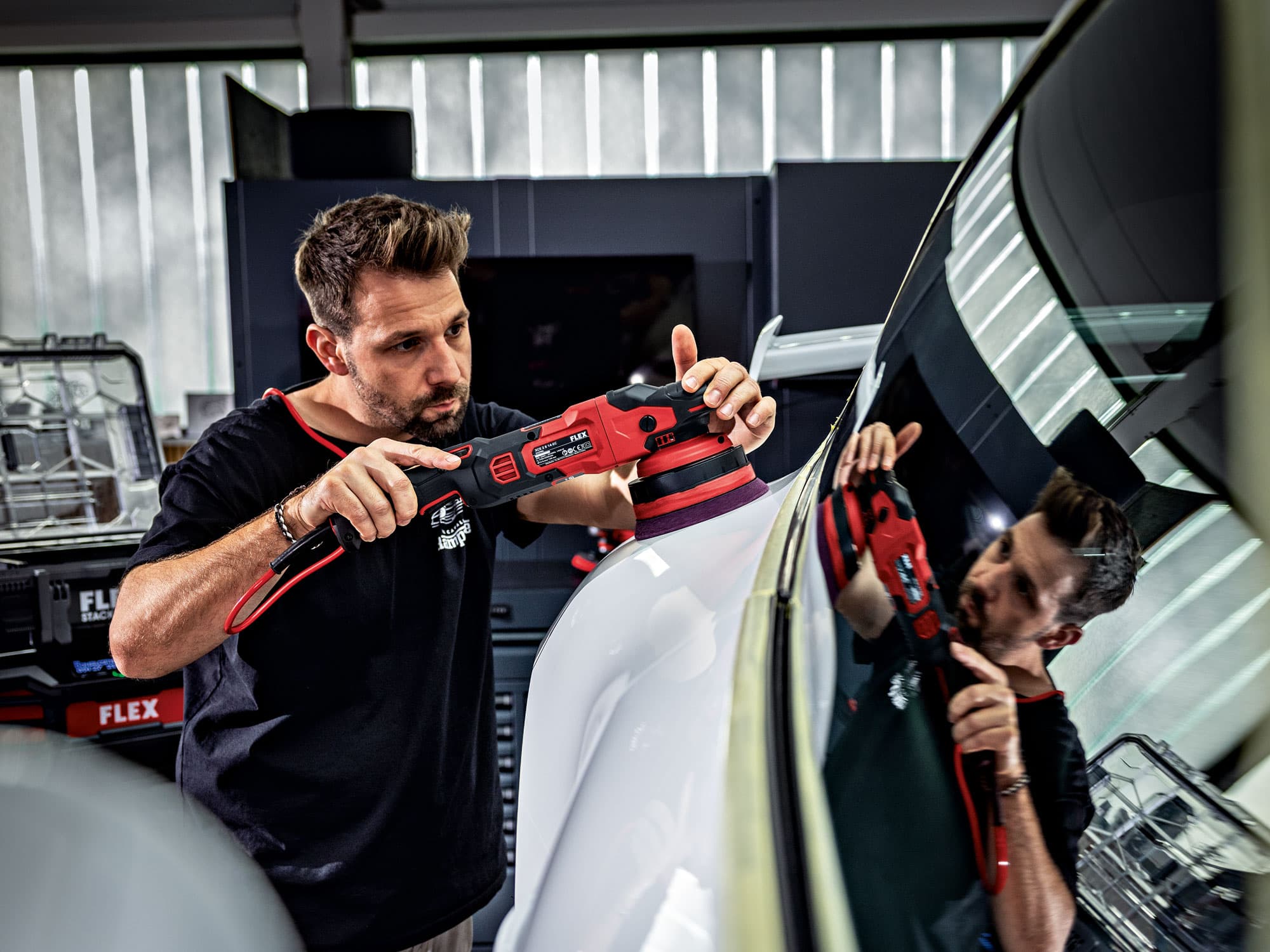 FLEX XCE 2 8 14-EC cable eccentric polisher with forced rotation for paint correction on a vehicle